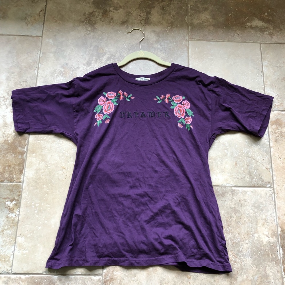 Purple top with flowers and reads “dreamer”